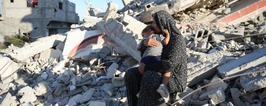 family in rubble iin Gaza